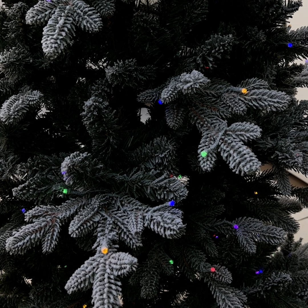 7Ft Flocked Balsam Fir Artificial Christmas Tree with 430 warm white & multi color led lights FLHL7 - MODA FLORA Santa's Workshop