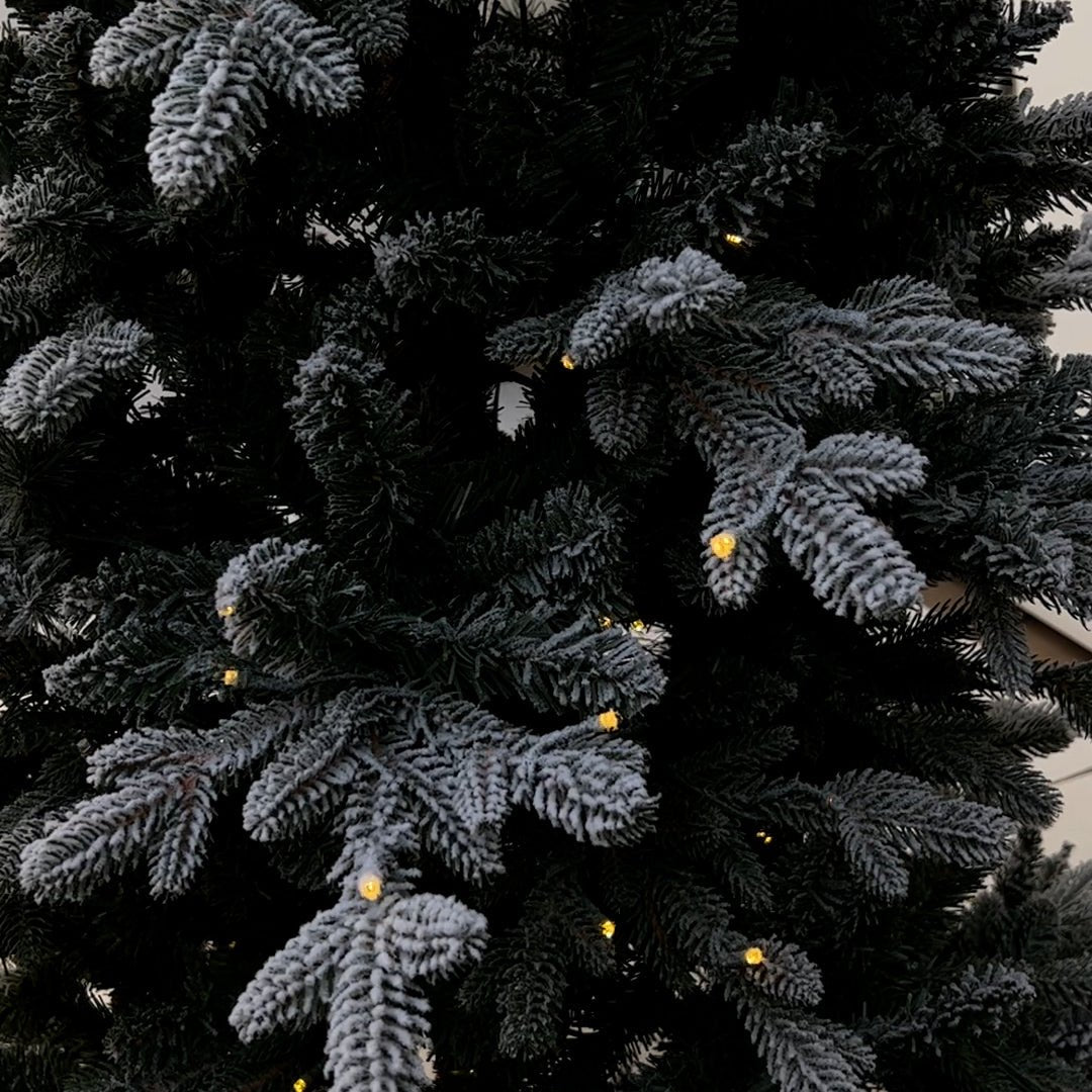 7Ft Flocked Balsam Fir Artificial Christmas Tree with 430 warm white & multi color led lights FLHL7 - MODA FLORA Santa's Workshop